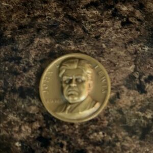 Gold Sculpture Medallion with Detailed Relief